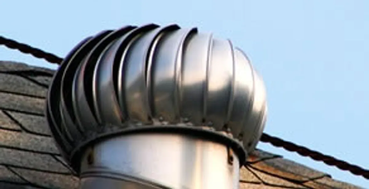 attic fan installation services with professionally installed roof ventilation unit in Olathe, KS