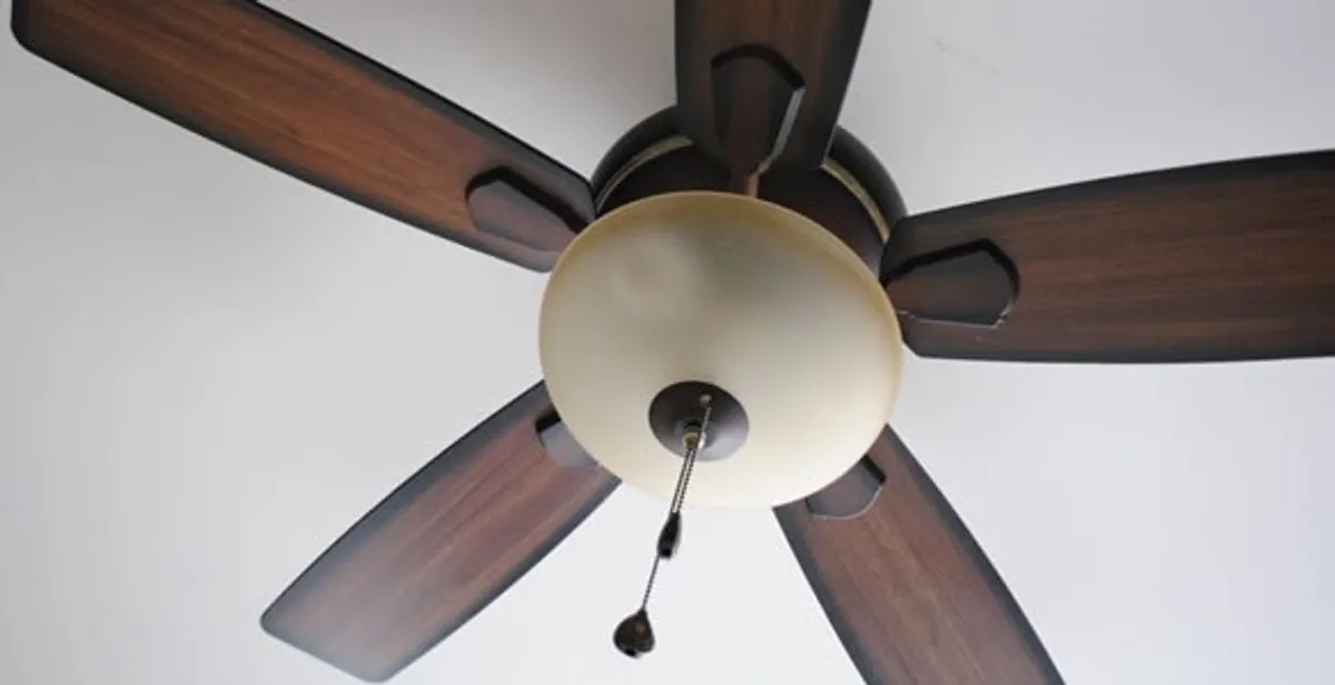 Fully installed ceiling fan with balanced blades and light fixture in Olathe, KS